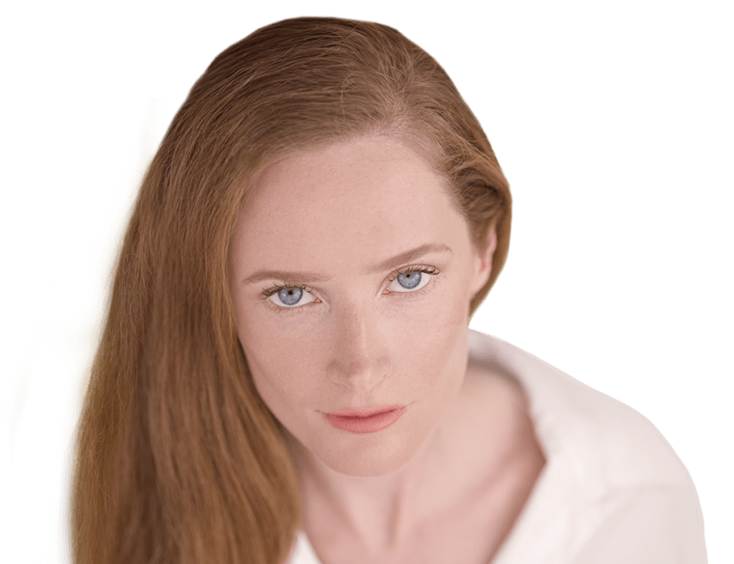 optilift-hero-woman-1 A woman with bright red hair looking upward