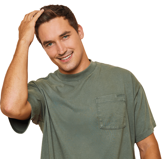 hair-loss-hero-man a man with beautiful hair smiling.