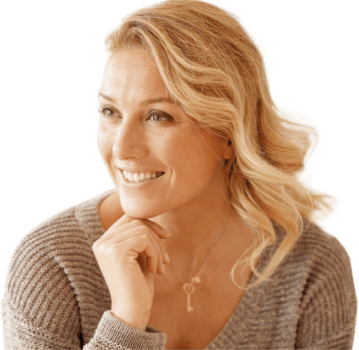 a woman smiling after Women’s Health treatment a woman smiling after Women’s Health treatment