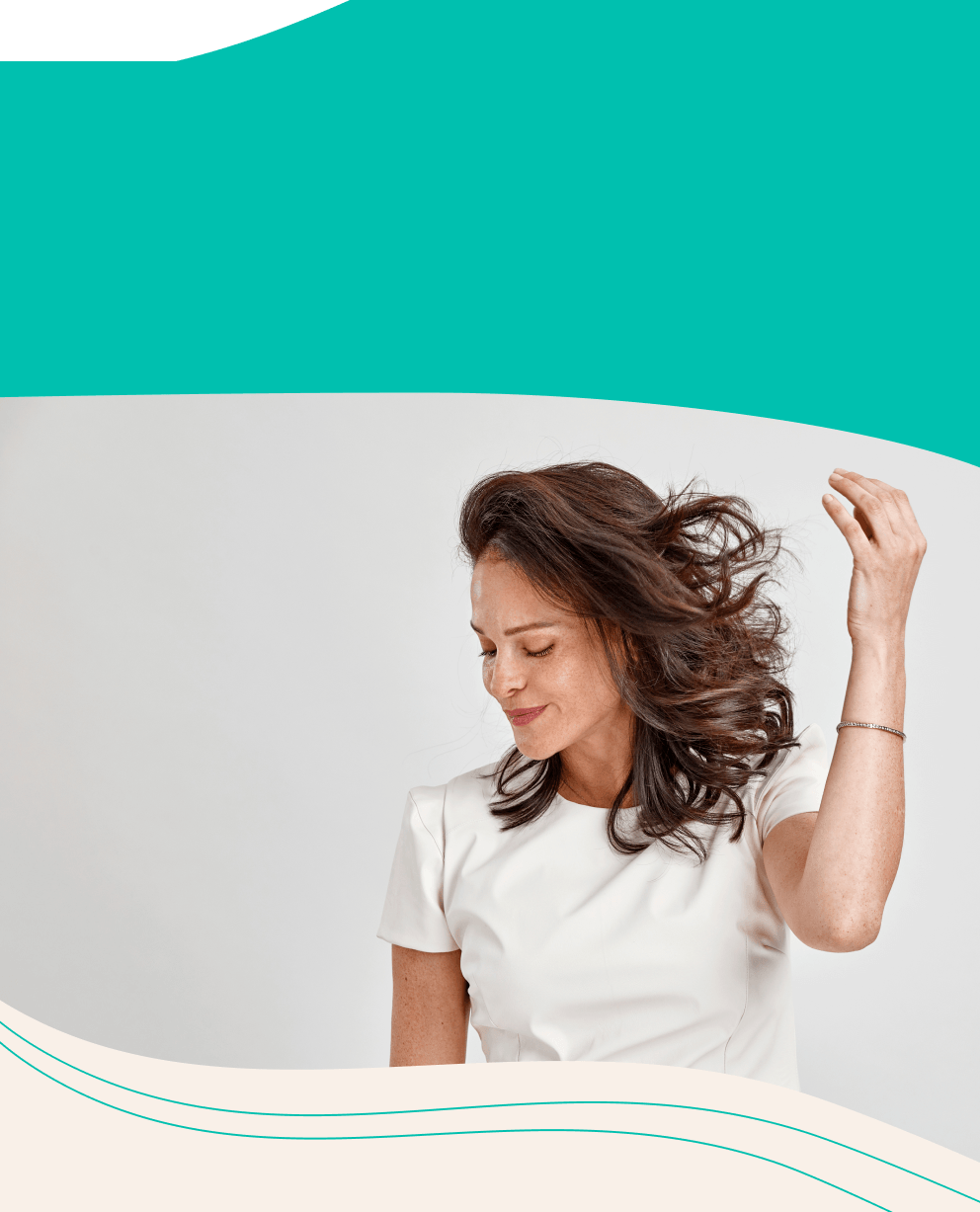 992 (1) A woman enjoys her beautiful hair.