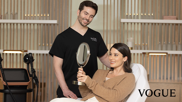 8. Vogue - triLift - Aesthetic Resource Hub - 640x360 A woman looking at the mirror and smiling – Vogue